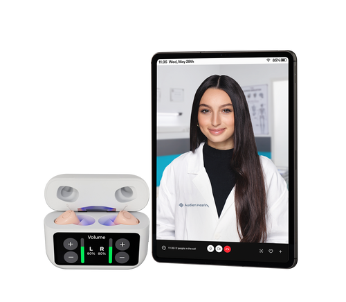 Tablet displaying a video call with a person in a white coat, next to a set of earbuds with control buttons.